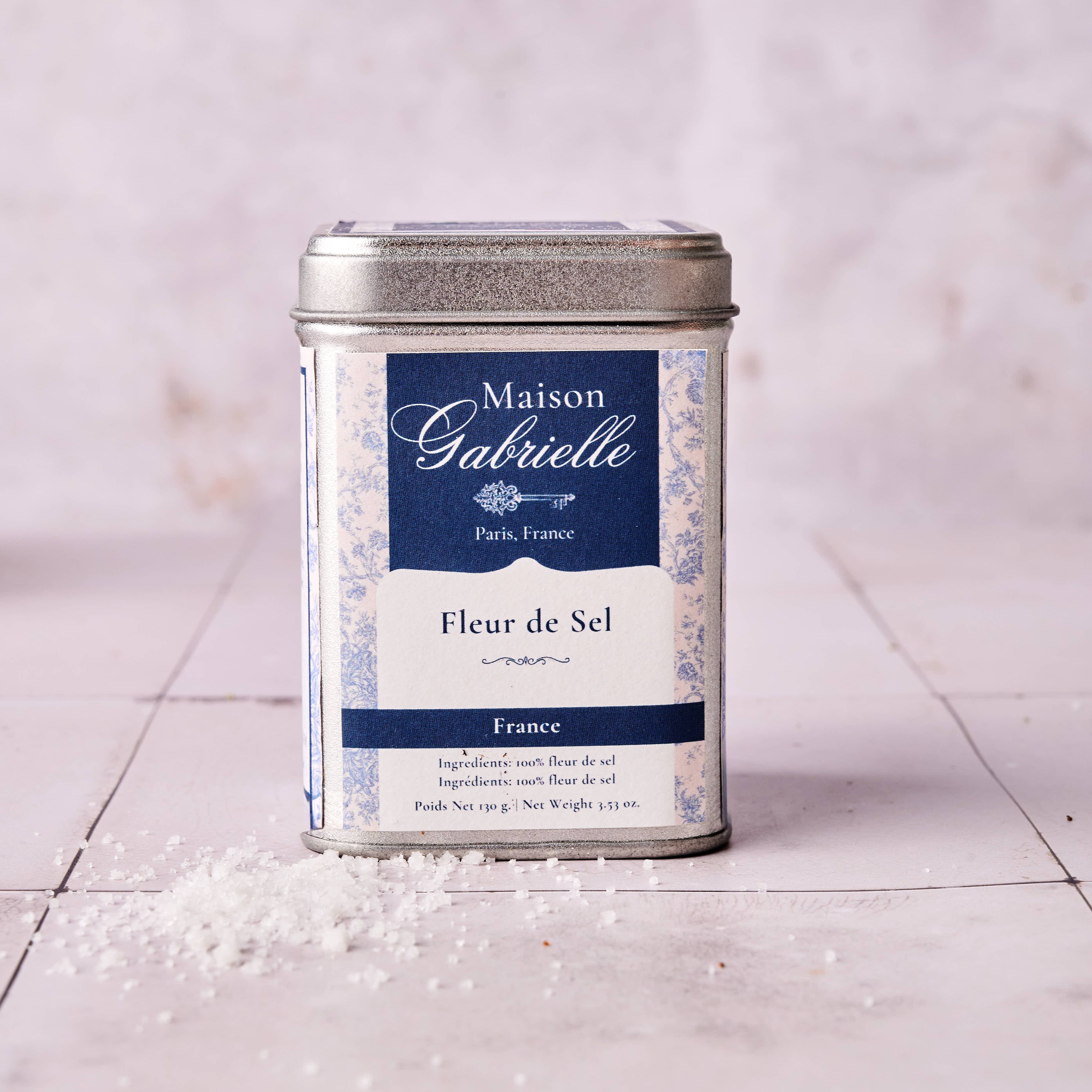 Maison Gabrielle Fleur de Sel salt canister on a light surface with a light background