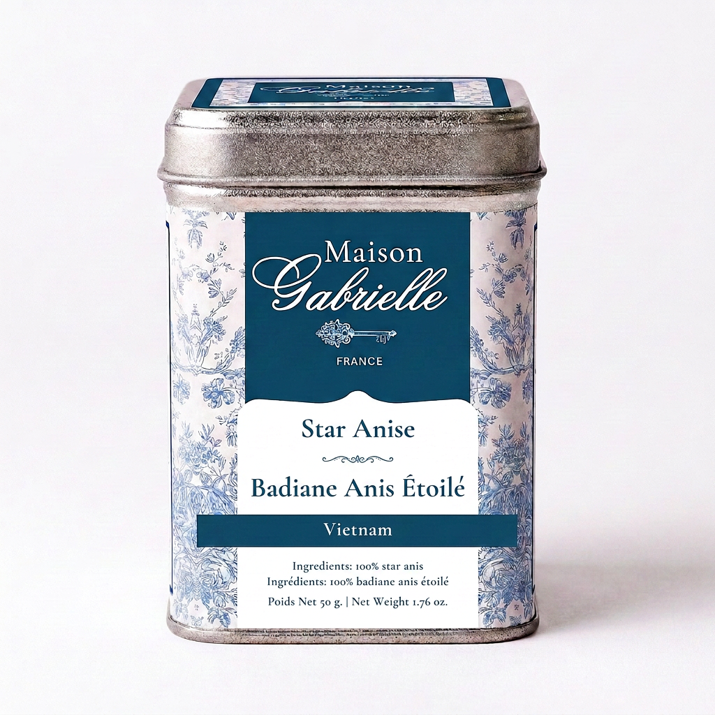 A metal tin of Maison Gabrielle Star Anise (Badiane Anis Étoilé) from Vietnam, featuring a blue and white floral pattern with a dark blue label.