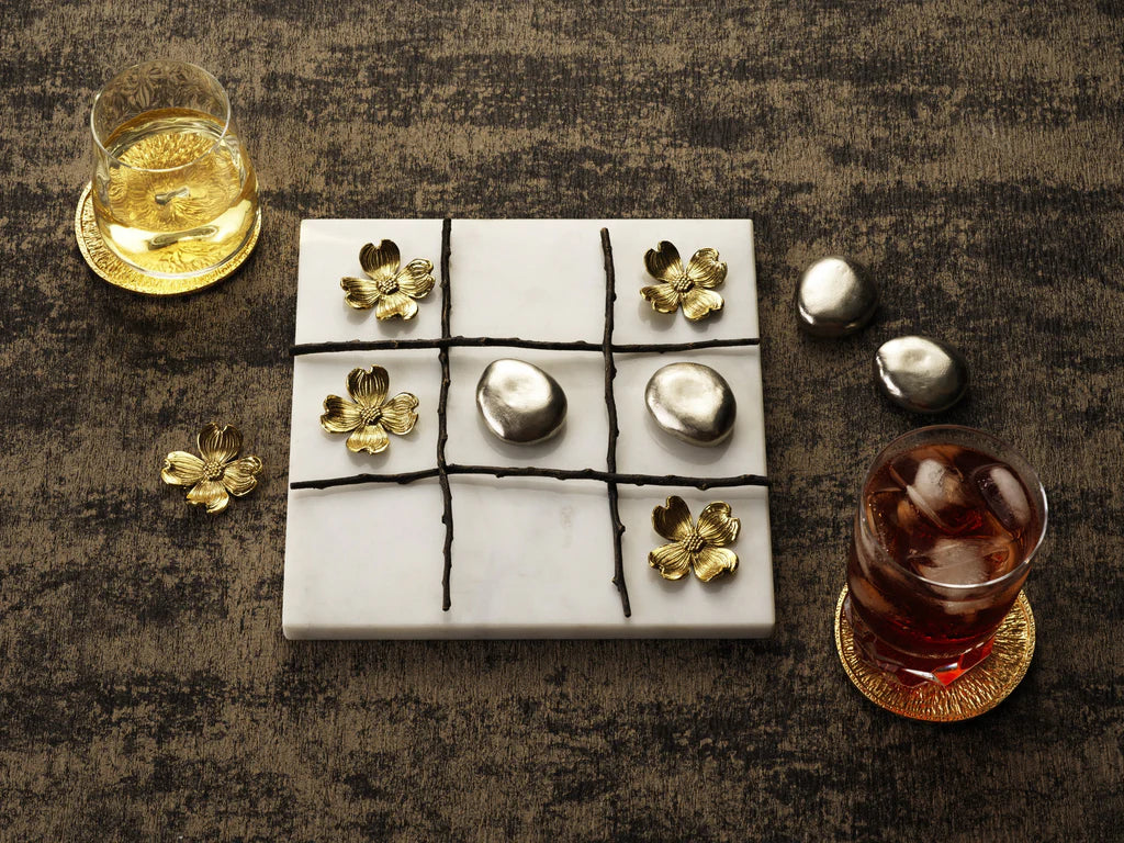 Maison Gabrielle Michael Aram Luxury Dogwood Tic Tac Toe Game and Gold Lemon Coasters Lifestyle Setting