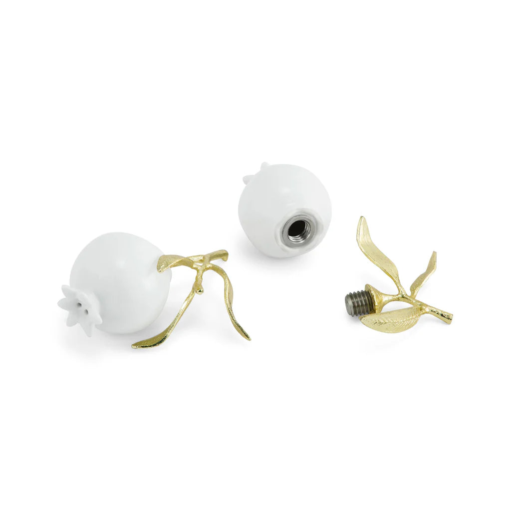 Maison Gabrielle Michael Aram Pomegranate Salt and Pepper Shakers showing the Removable Gold Leaf Base and White Porcelain Fruit Detail